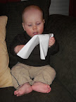 7 months old - 7/27/09 ...wants to chew on the sign I made.