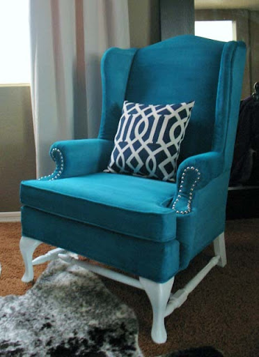 Wingback chair with white legs