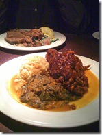 Pulled pork with collards foreground, smoked brisket in back