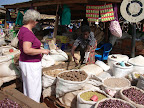 Bev buying potatoes at the local market in Kitgum