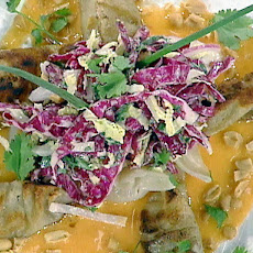 Scallop Dumplings with Asian Slaw and Chili Butter Sauce