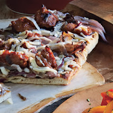 Grilled Flatbreads with Caramelized Onions, Sausage, and Manchego Cheese