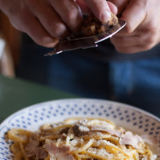 Unusual and luxurious carbonara with white truffle and duck breast