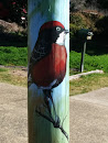 Red Bird Mural On Pole