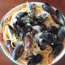 Garlicky Mussels in a Rich Lemon, Fresh Herb, Butter Sauce