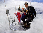 Bear Grylls dining in hot air balloon