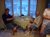 My father and grandfather (father's side) at the table.