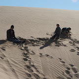 Building sand castles to pass the time while waiting for Danny to return with some more tools.