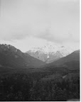 the view from the train - grey clouds and gorgeous mountains