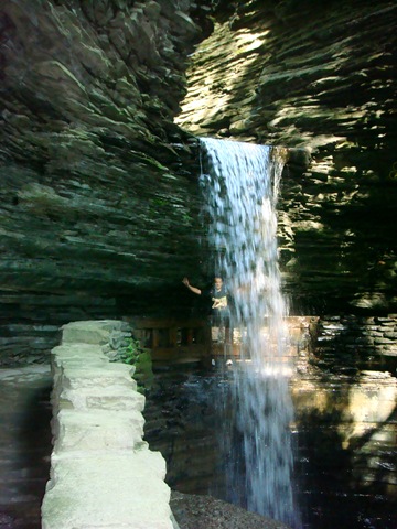 [Anoop waving from behind the Cavern cascade[2].jpg]