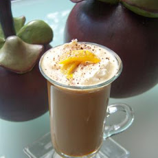 Orange Coffee Topped With Honey Nougat Chocolate And Orange Peel