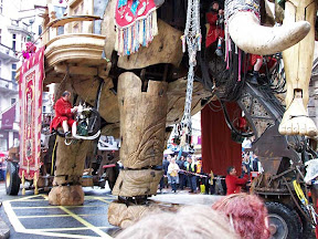 Underside of elephant, showing men operating the hydrolics