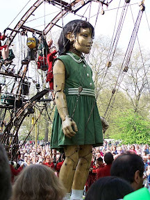 The girl being lifted to her feet