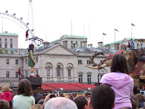 The little girl is lowered into her rocket