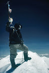 On top of the world: Tenzing on the summit of Mt Everest. 
Photograph taken by Hillary, 29 May 1953