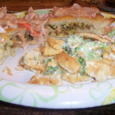 Leek Stuffed Crescents Topped With Lobster Butter Cream Sauce