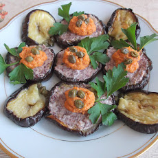 Roasted Eggplant Rounds Topped with Olive Tapenade and Artichoke-Roasted Red Pepper Spread