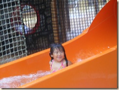 Mandy coming down the slide