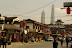 Walking to Yu Yuan garden. Over in Pudong is the tallest building in Shanghai, Jinmao Tower (on the left), and the soon to be tallest Shanghai World Financial Center (on the right).