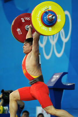 龍清泉勇奪男子舉重56公斤級金牌