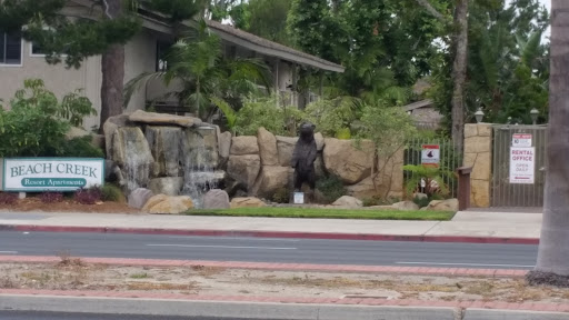 Bear Statue and Waterfall