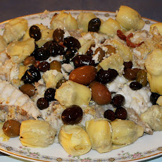 Oven-baked Angler with Artichoke Hearts and Spicy Olives