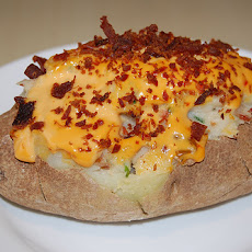 Twice Baked Potatoes With Seafood Topping