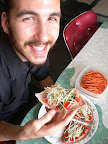 Sean's raw veggie topped pizza plus homemade dehydrated yam fries