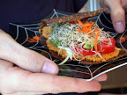 Raw wrap with veggie/nut pate, tomatoes, zucchini, avocado, carrot and alfalfa sprouts