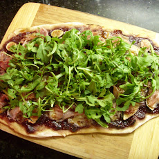 Fresh Fig Jam Flatbread with Roasted Figs, Prosciutto, Manchego and Arugula
