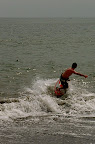 Jason skipping over a misguided wave