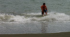 Jason just slashing some flat water, no wave this time.