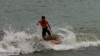 Jason pushing around a small wave
