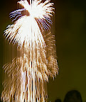 Someone looks at me in a fireworks shower