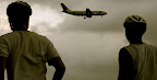 The Mikes watch in disbelief a low-flying plane
