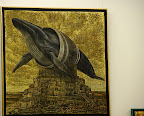 Whale stuck in a barrel, I couldn't tell you what it means