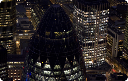 The financial district, featuring the tip of 30 St. Mary's Axe, known by the nickname "The Gherkin" Jason Hawkes