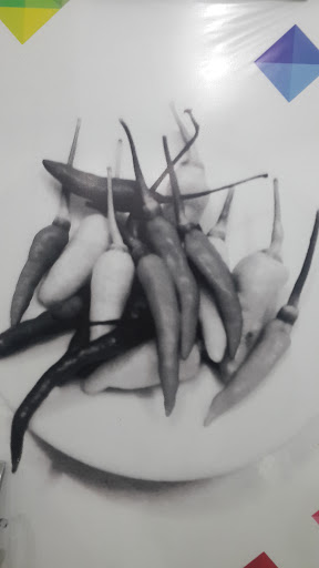 Black & White Chilies On The Plate