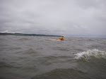 The brown water here is from the Kalamazoo river dumping into Lake Michigan. keithwikle.com