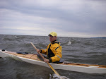 Doug Van Doren pausing to pose for the shot. Lake Michigan paddle Saugatuck, sea kayak trip, keithwikle.com