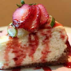Key Lime Cheesecake With Strawberry Butter Sauce