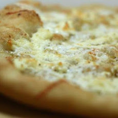 White Four-Cheese Pizza with Basil and Garlic