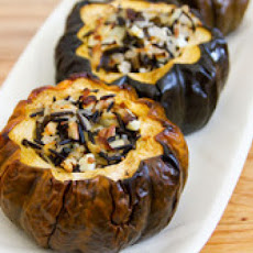 Baked Acorn Squash with Wild Rice, Pecan and Cranberry Stuffing