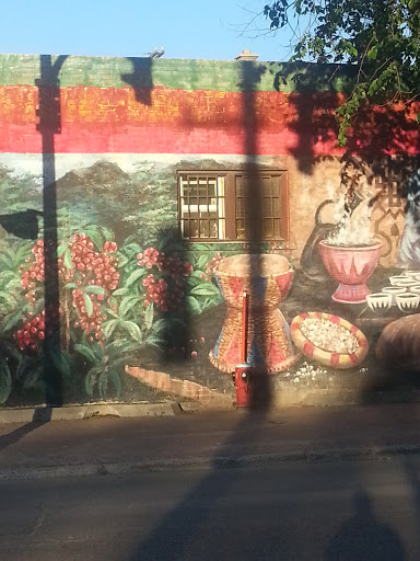 Mural on the side of ShawarmaTime Restaurant