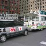Vans with nationalist slogans outside the grounds of the Imperial Palace