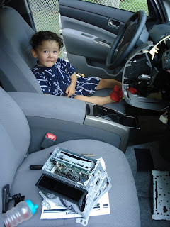 The CD player with the change it, and the little boy who put it there