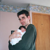 Kai in Dad's arms, in the hospital