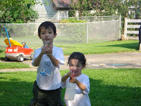 Kai and Eidan getting the cameraman (me) wet