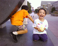 Eidan and Kai on the Awakening statue at Villanova