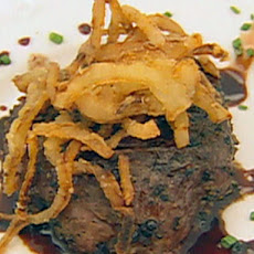 Peppercorn Encrusted Beef Tenderloin on Beef Tomato with Goat Cheese, French Fried Onions and Balsamic Vinegar Sauce
